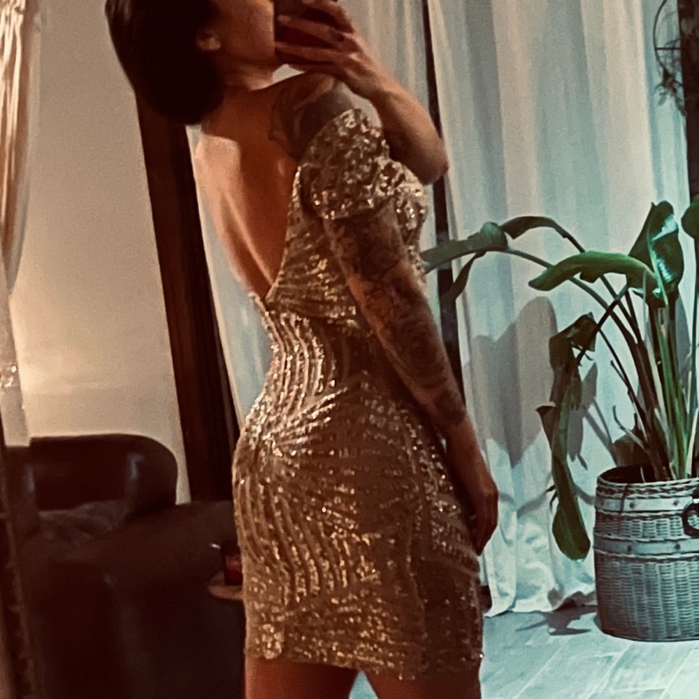 Perfect condition, never worn.No tag. Dress the population